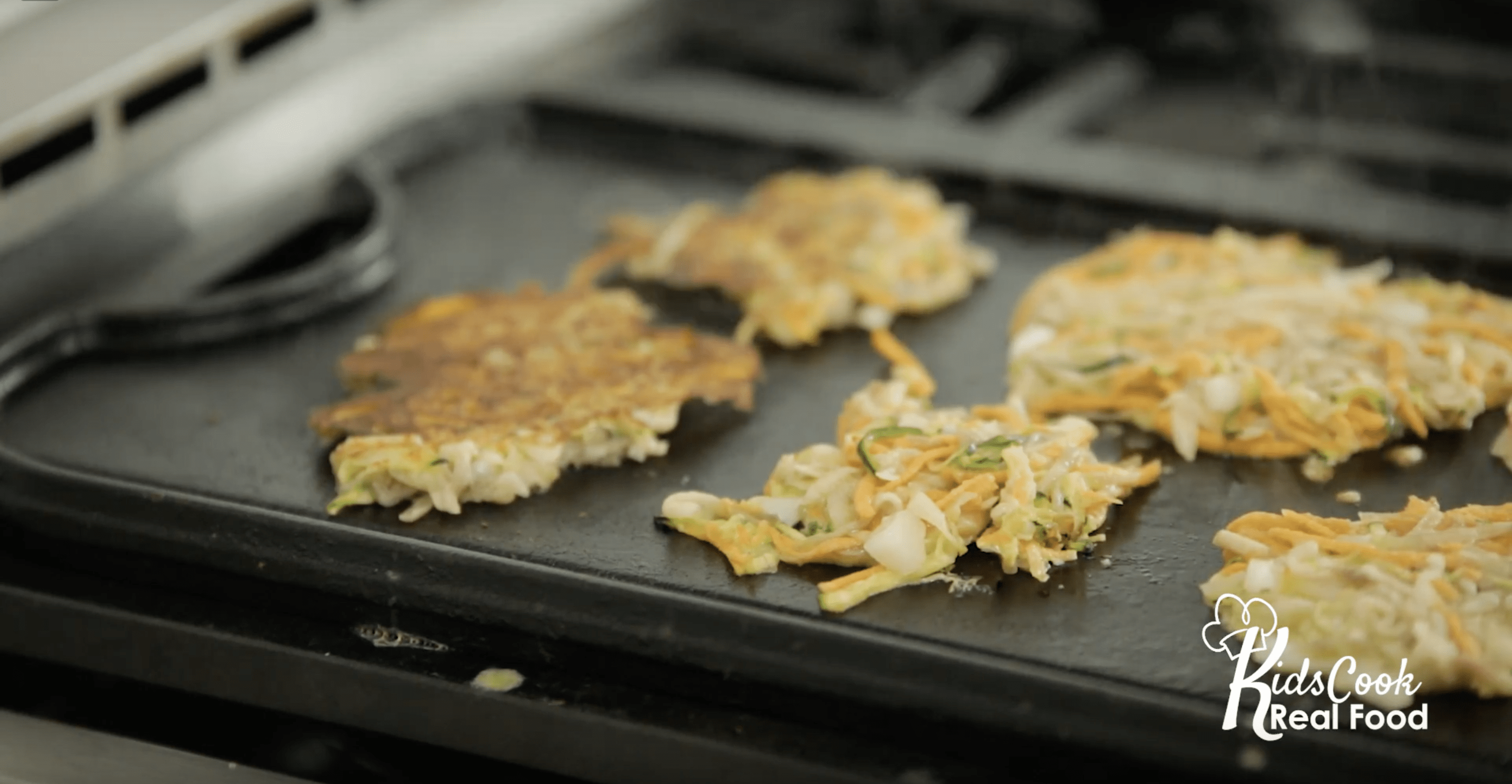 potato veggies pancakes on the griddle
