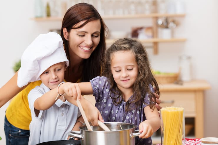 Kids cooking in the kitchen with mom