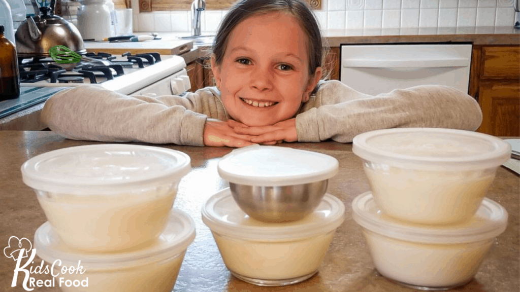 Girl with bowls of pudding