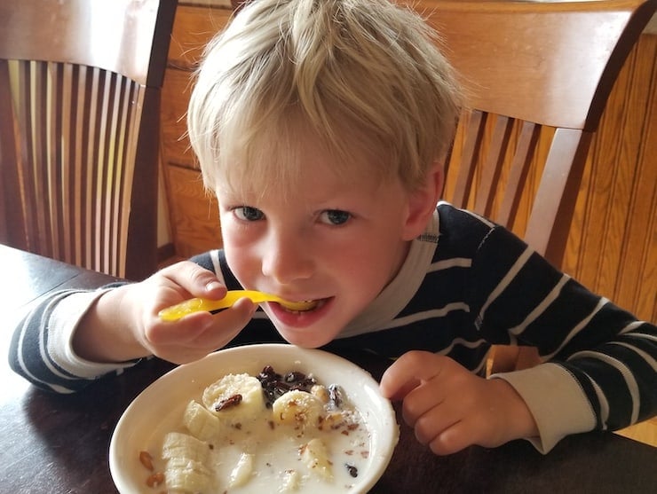 Kid eating breakfast