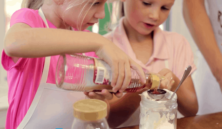 girls making salad dressing