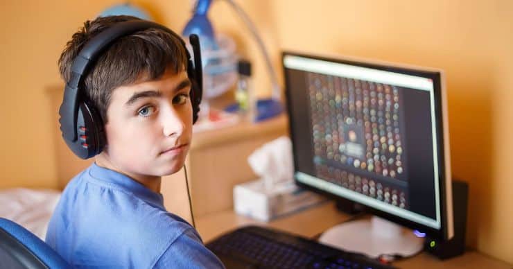 teen working on computer