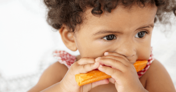 girl eating carrot