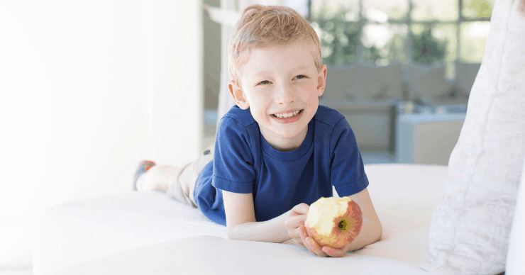 boy eating apple