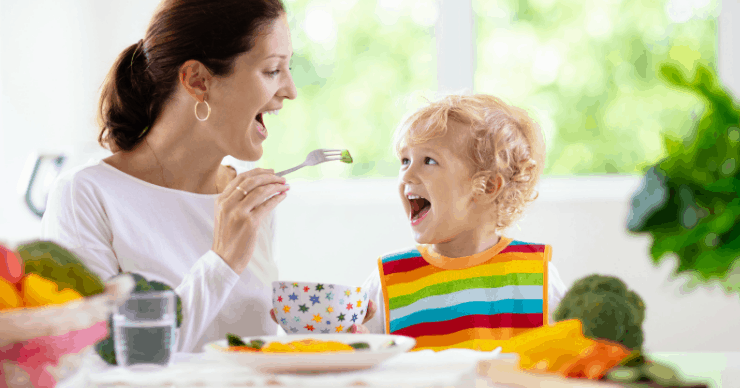kid eating vegetables