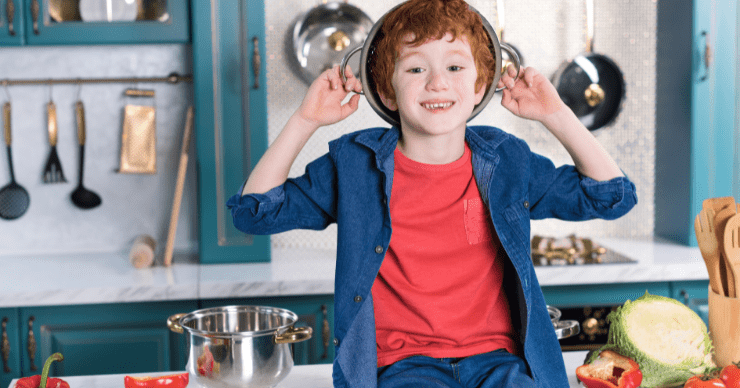 boy with colander on head
