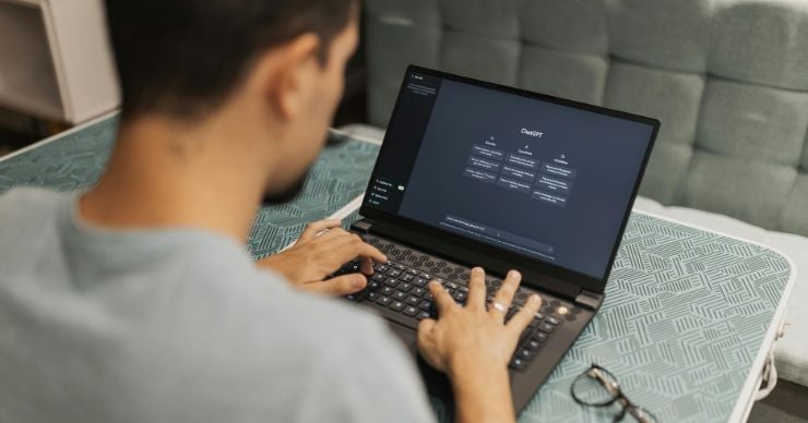 man on computer