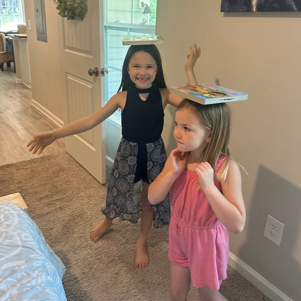 Two sisters talking face to face in the hallway